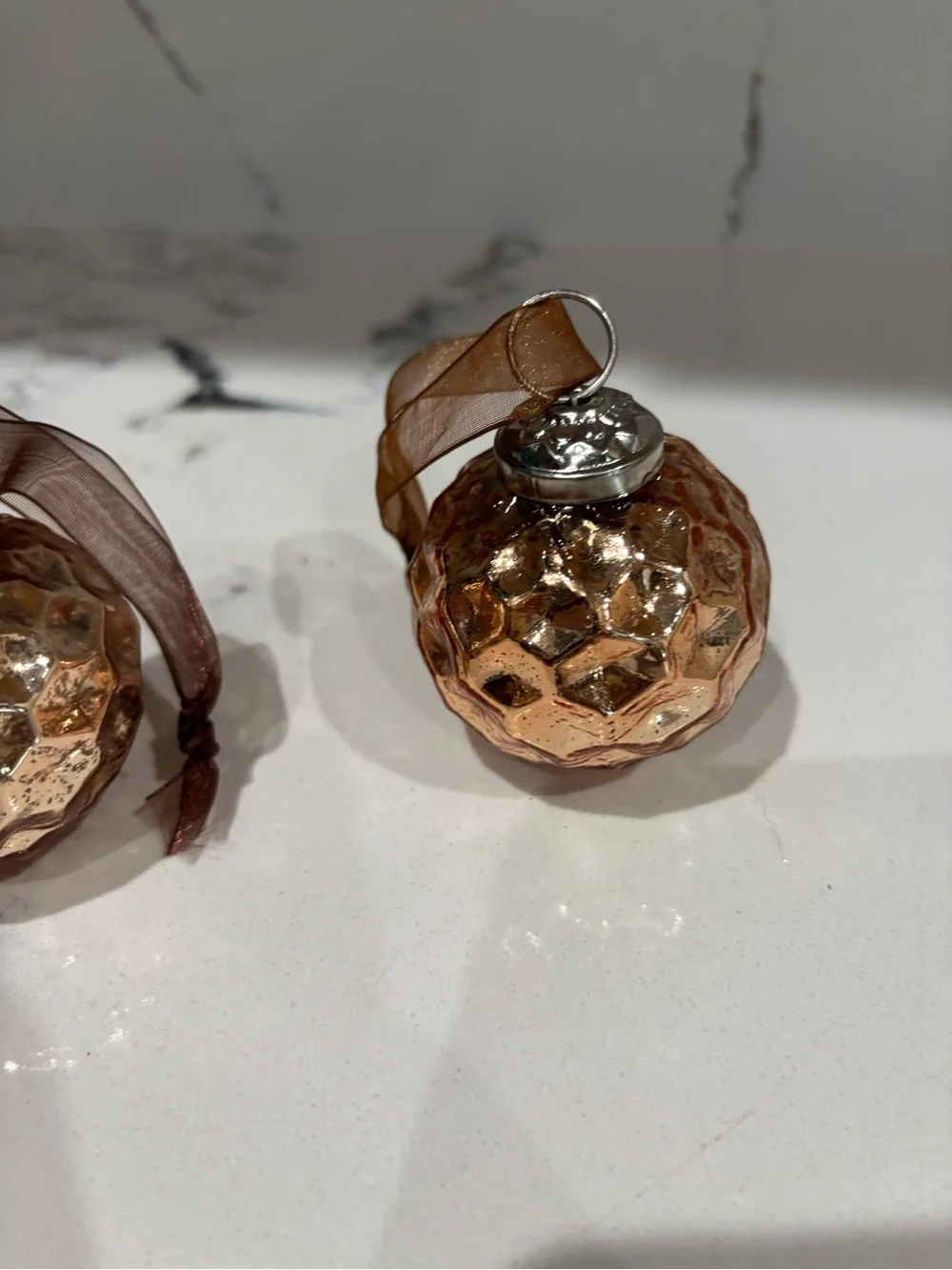 Shiny Rose Gold Textured Glass Ornament with Brown Ribbon